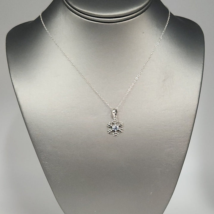 Sterling Silver Snowflake Pendant Necklace With Natural Blue Topaz