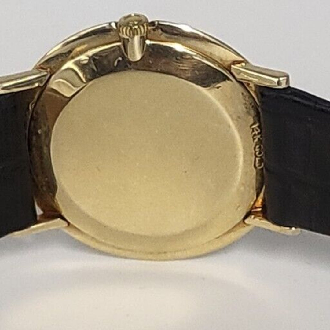 1960s OMEGA 32 mm .Vintage Mechanical 14k Yellow Gold Gents Dress Watch