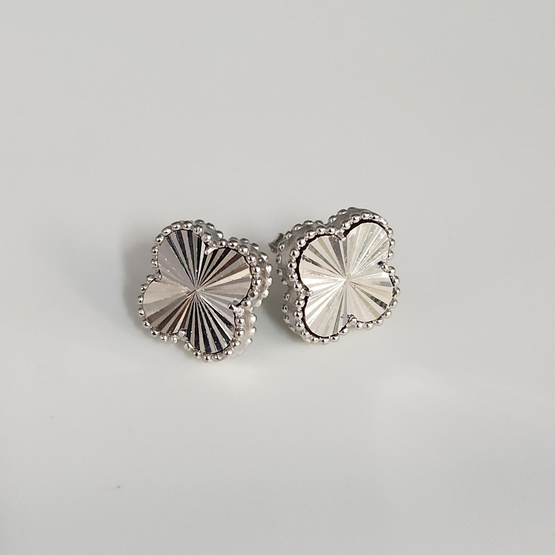 Delicate Sterling Silver Radiant Flower Stud Earrings