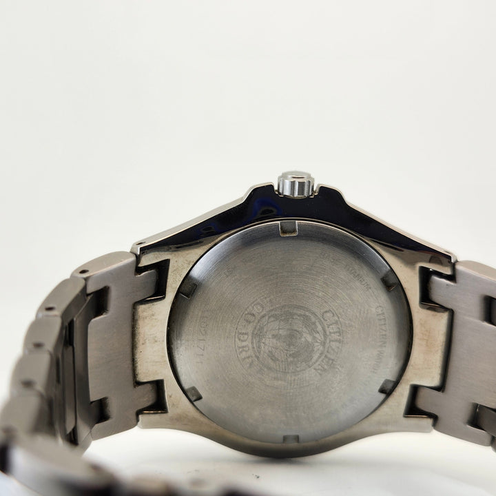 Citizen Eco-Drive Titanium WR100 Black Dial Men's Quartz Solar Watch E111