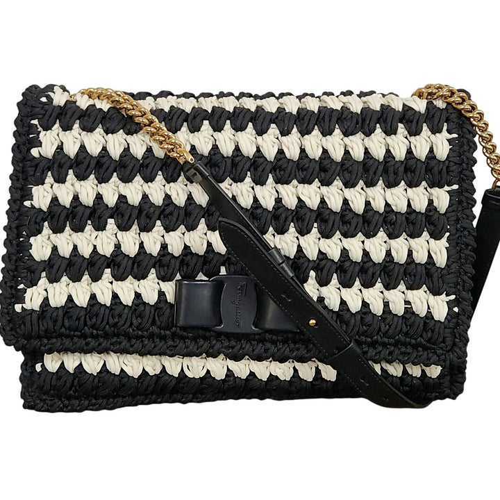 Ferragamo black & white handwoven shoulder bag  gold chain strap signature bow