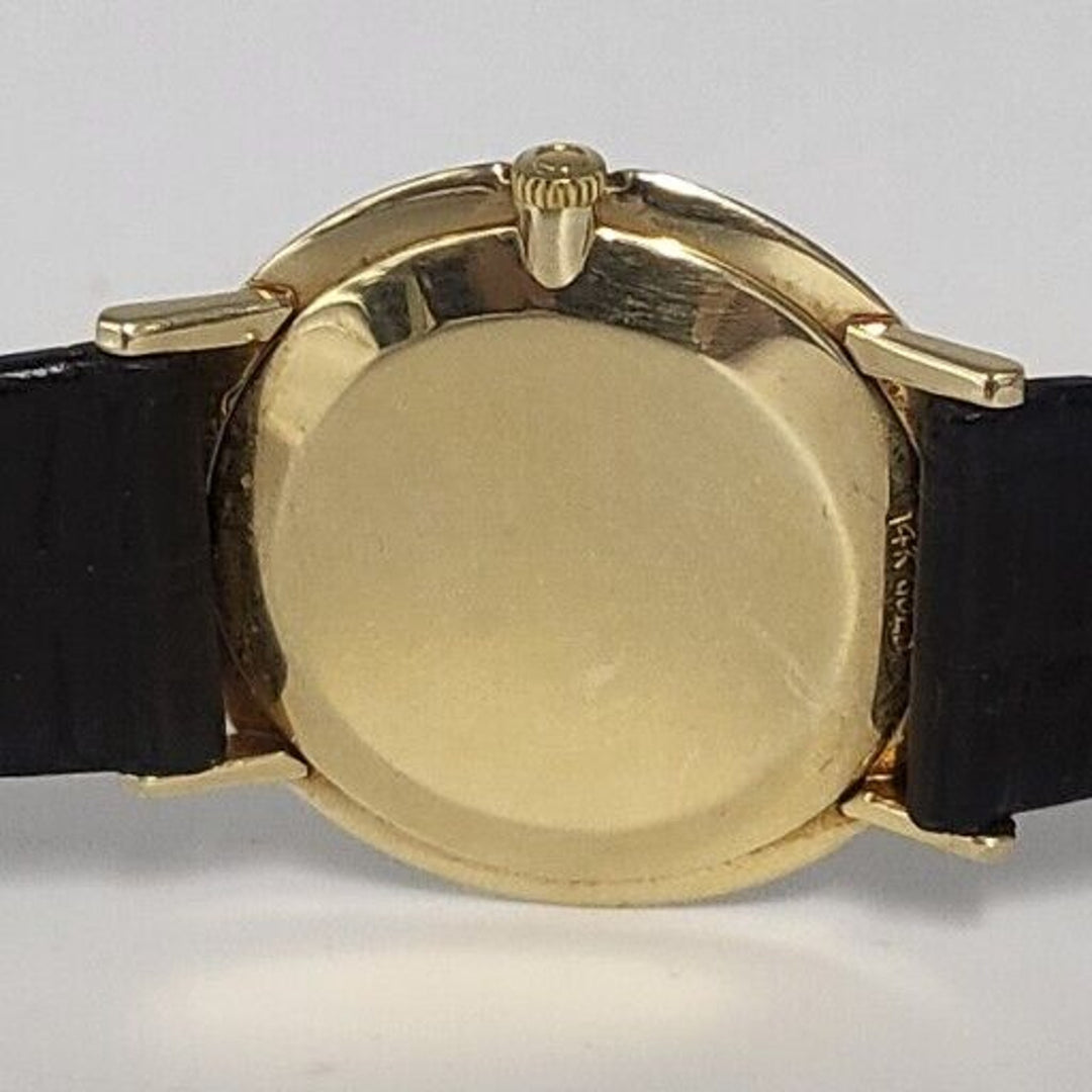 1960s OMEGA 32 mm .Vintage Mechanical 14k Yellow Gold Gents Dress Watch