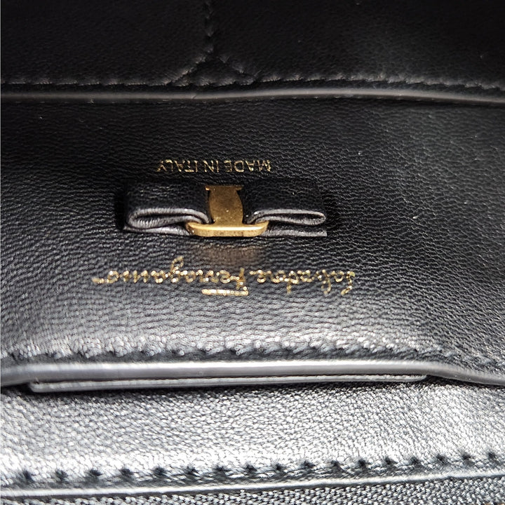 Ferragamo black & white handwoven shoulder bag  gold chain strap signature bow