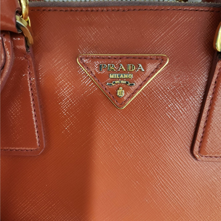 Authentic Prada Orange Saffiano Vernic Handbag w/ Gold Hardware & Shoulder Strap