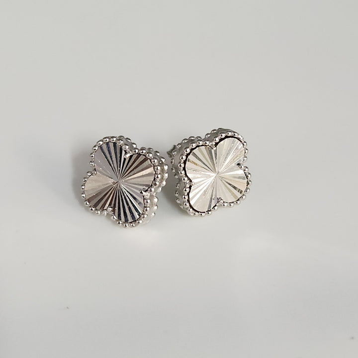 Delicate Sterling Silver Radiant Flower Stud Earrings