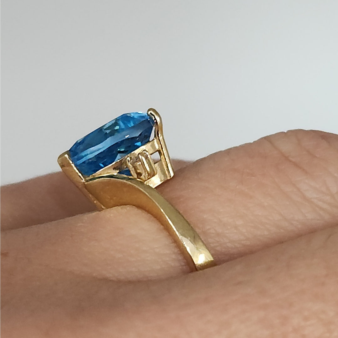 14k Yellow Gold Heart Cut Blue Topaz Ring With Diamond Accent