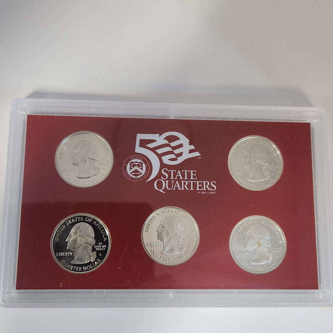 Collection Of 1999, 2000, 2003 And 2005 United States Mint Sliver Proof Set