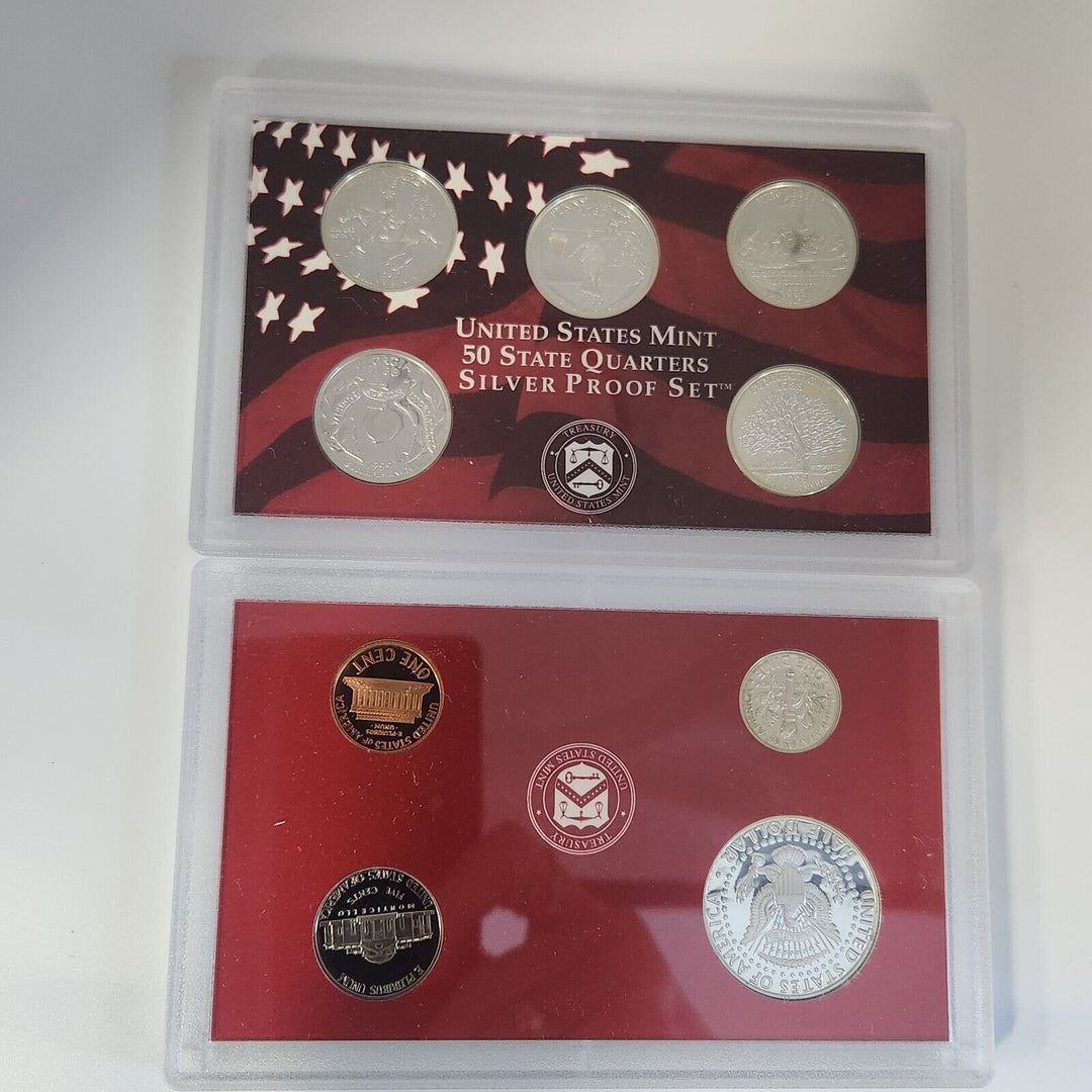 Collection Of 1999, 2000, 2003 And 2005 United States Mint Sliver Proof Set