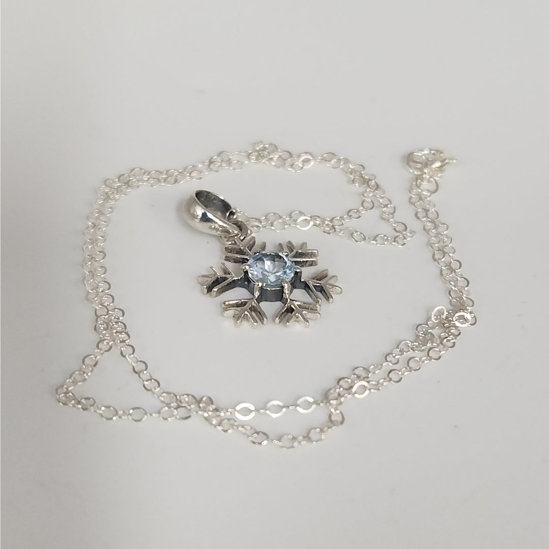 Sterling Silver Snowflake Pendant Necklace With Natural Blue Topaz