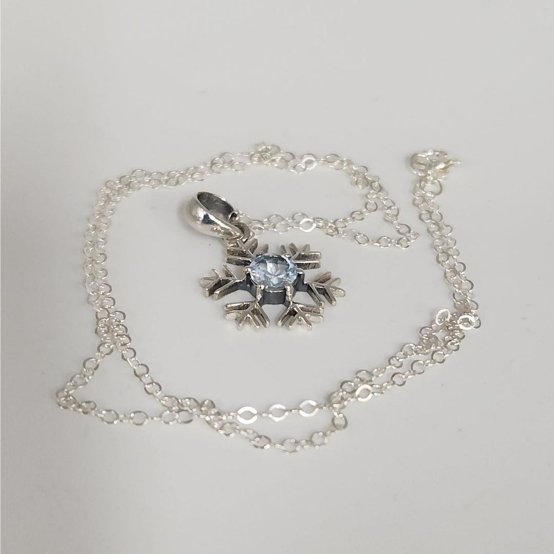 Sterling Silver Snowflake Pendant Necklace With Natural Blue Topaz