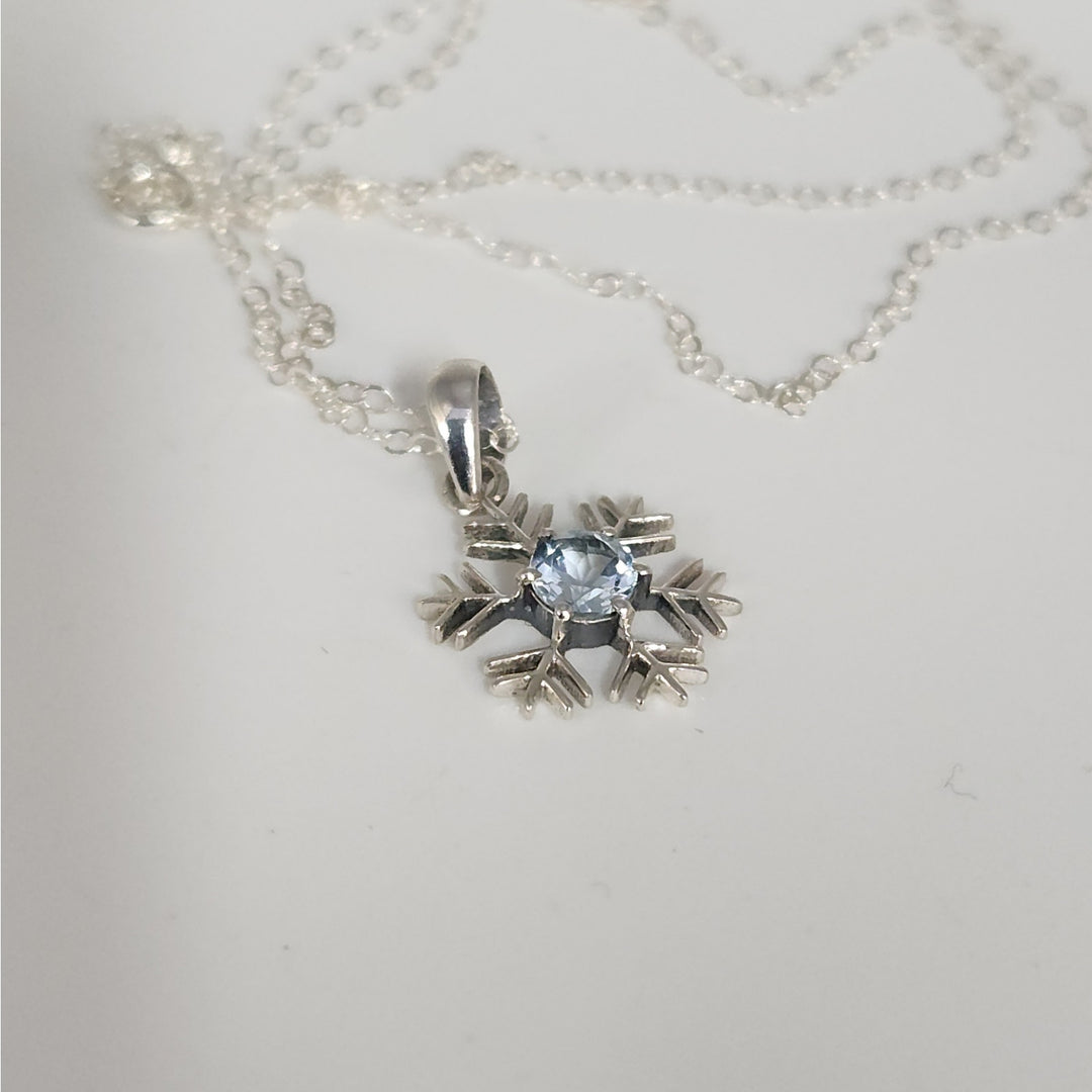 Sterling Silver Snowflake Pendant Necklace With Natural Blue Topaz