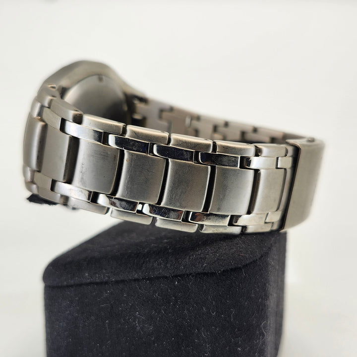 Citizen Eco-Drive Titanium WR100 Black Dial Men's Quartz Solar Watch E111