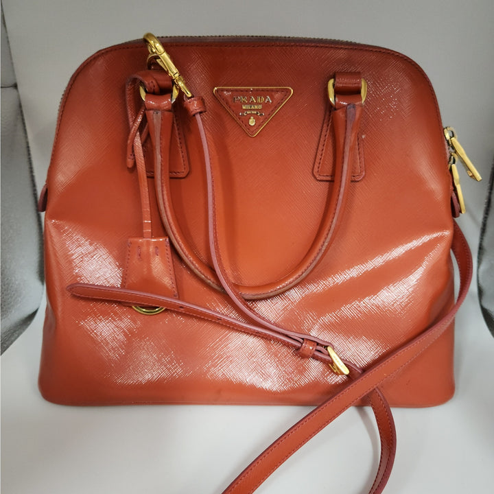 Authentic Prada Orange Saffiano Vernic Handbag w/ Gold Hardware & Shoulder Strap
