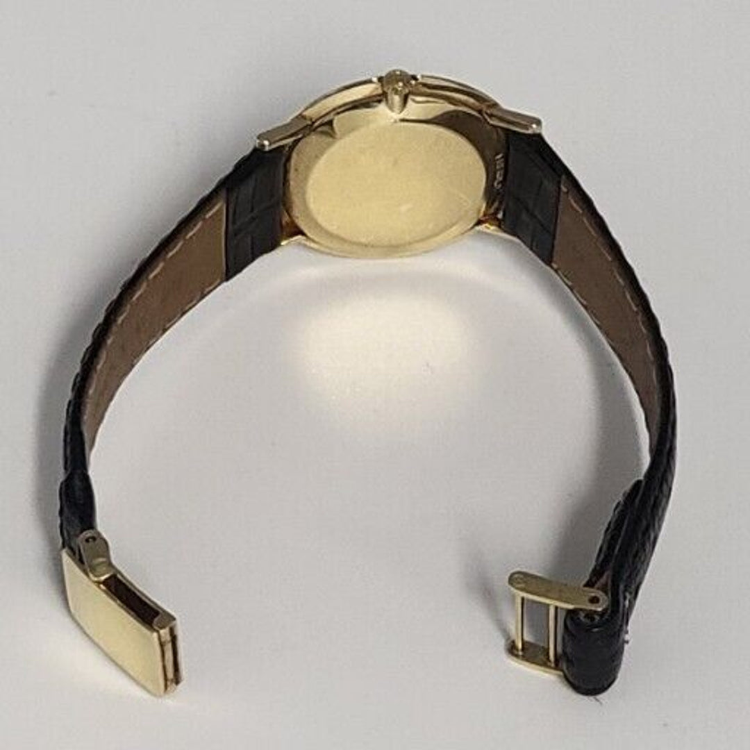 1960s OMEGA 32 mm .Vintage Mechanical 14k Yellow Gold Gents Dress Watch