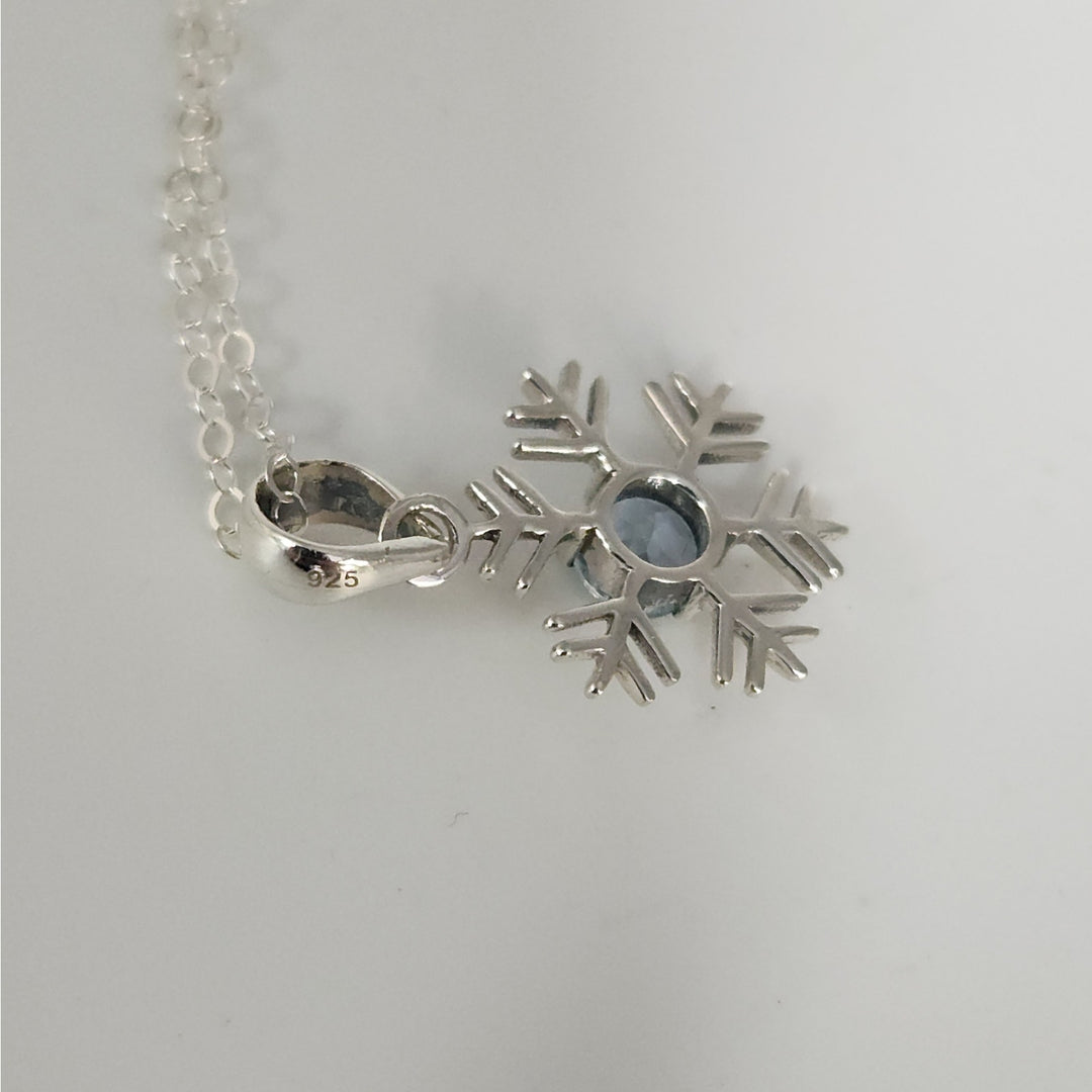 Sterling Silver Snowflake Pendant Necklace With Natural Blue Topaz