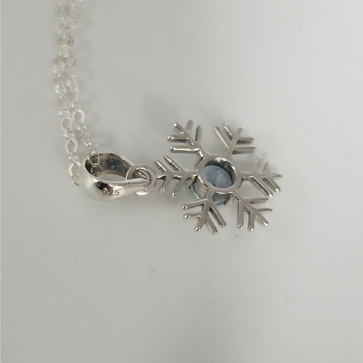 Sterling Silver Snowflake Pendant Necklace With Natural Blue Topaz