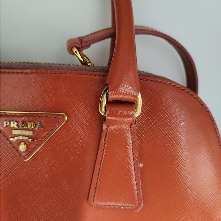 Authentic Prada Orange Saffiano Vernic Handbag w/ Gold Hardware & Shoulder Strap