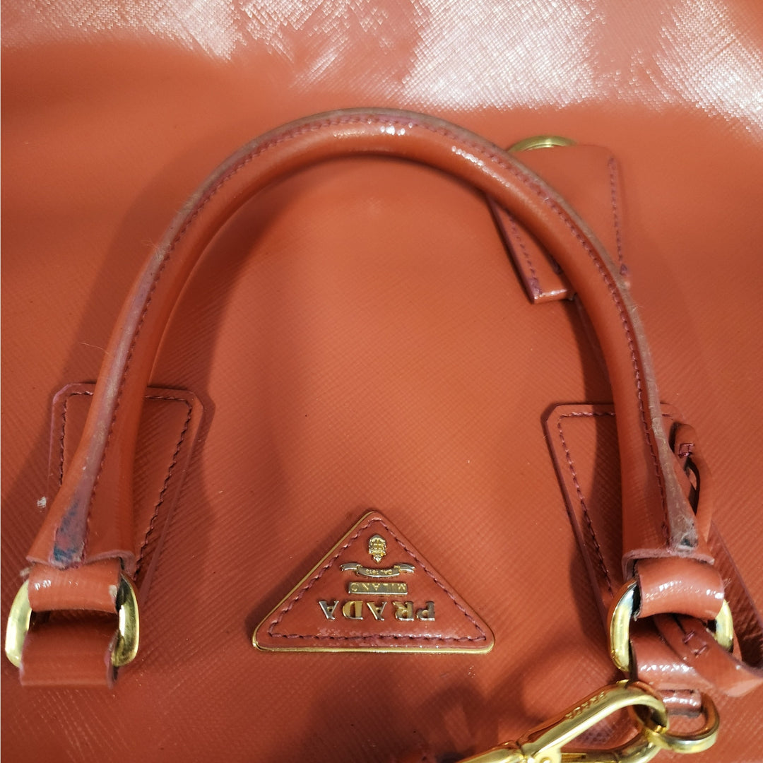 Authentic Prada Orange Saffiano Vernic Handbag w/ Gold Hardware & Shoulder Strap