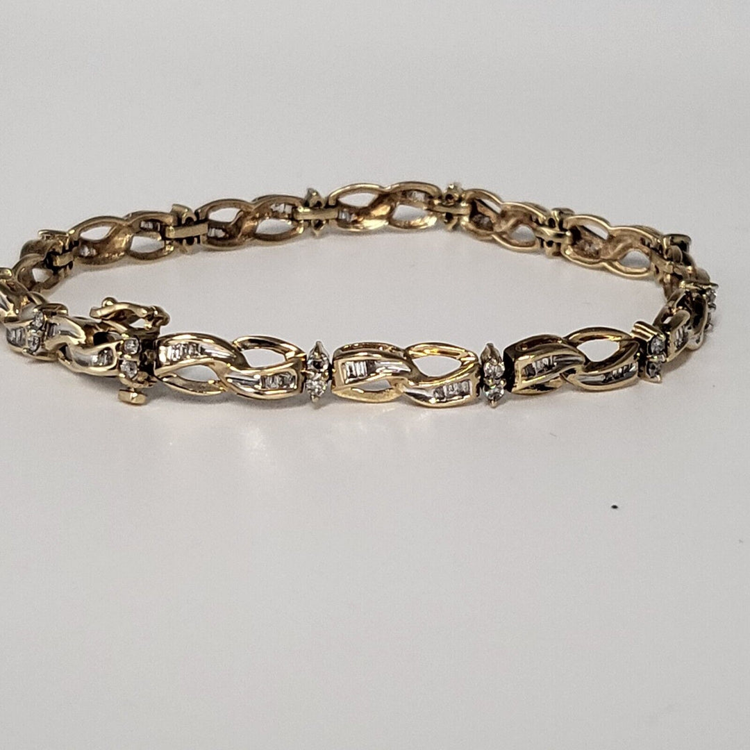 Beautiful 10K yellow gold oval link Diamonds Bracelet 7"