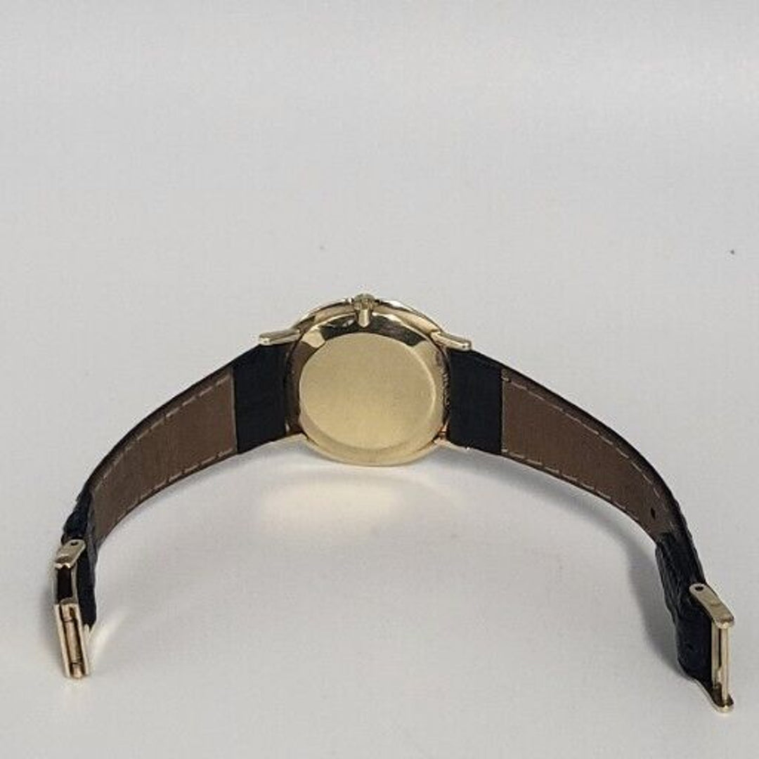 1960s OMEGA 32 mm .Vintage Mechanical 14k Yellow Gold Gents Dress Watch