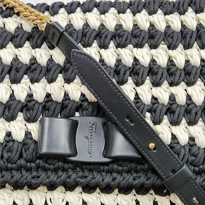 Ferragamo black & white handwoven shoulder bag  gold chain strap signature bow