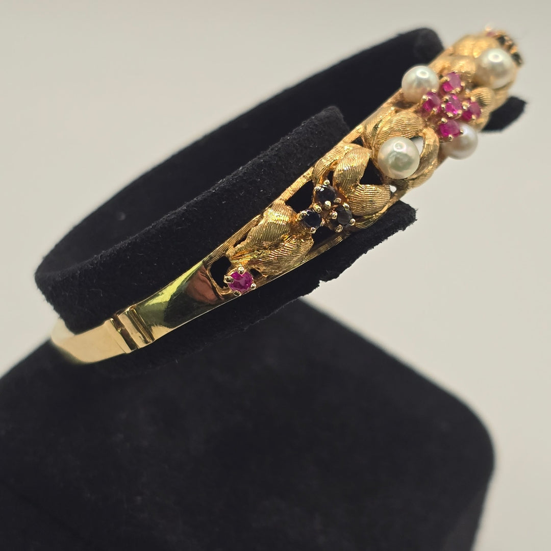 Vintage 14K Yellow Gold Pearl Ruby Sapphire Floral Hinged Bangle 15.6g