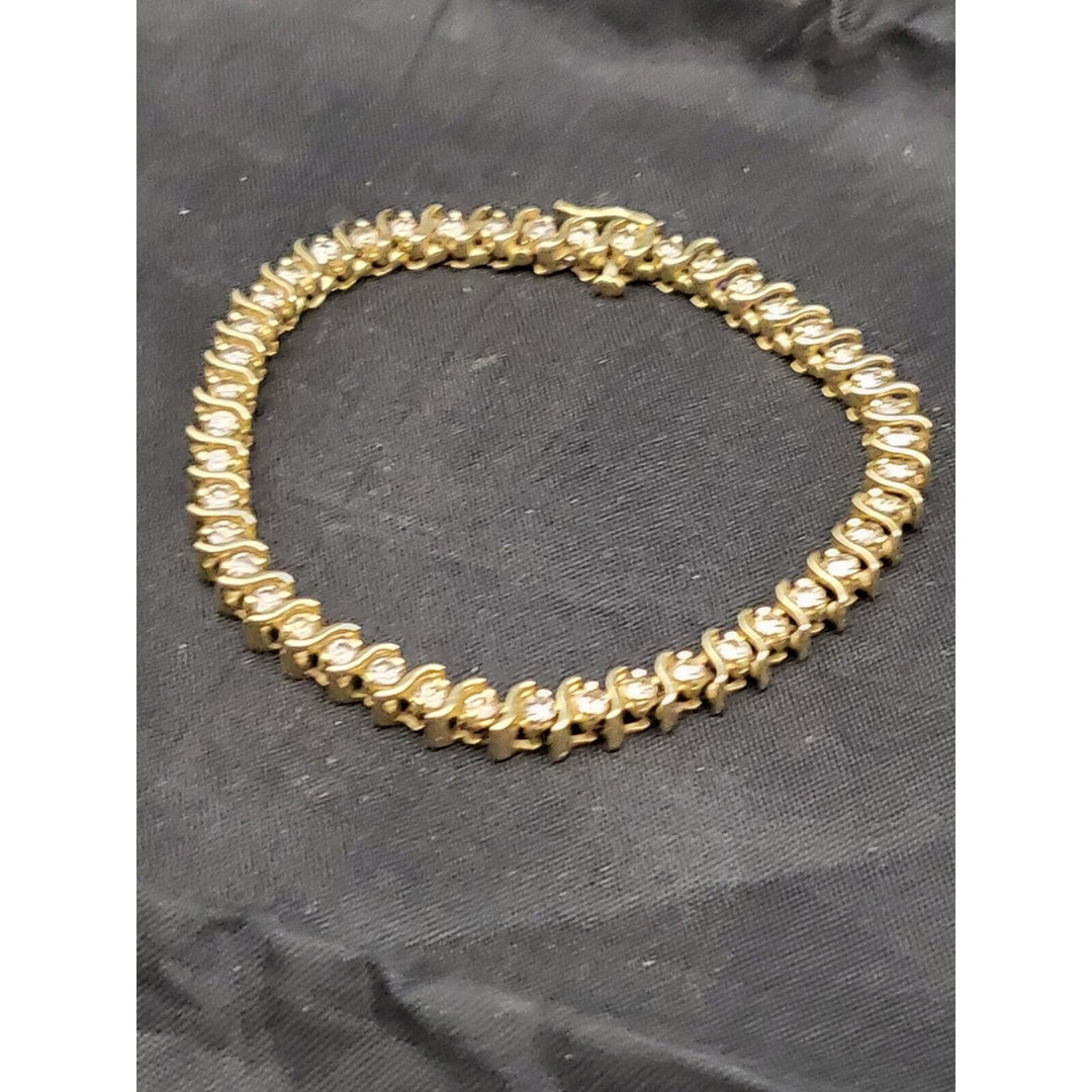 14k Yellow Gold Diamond Tennis bracelet With 15.3g Of Gold