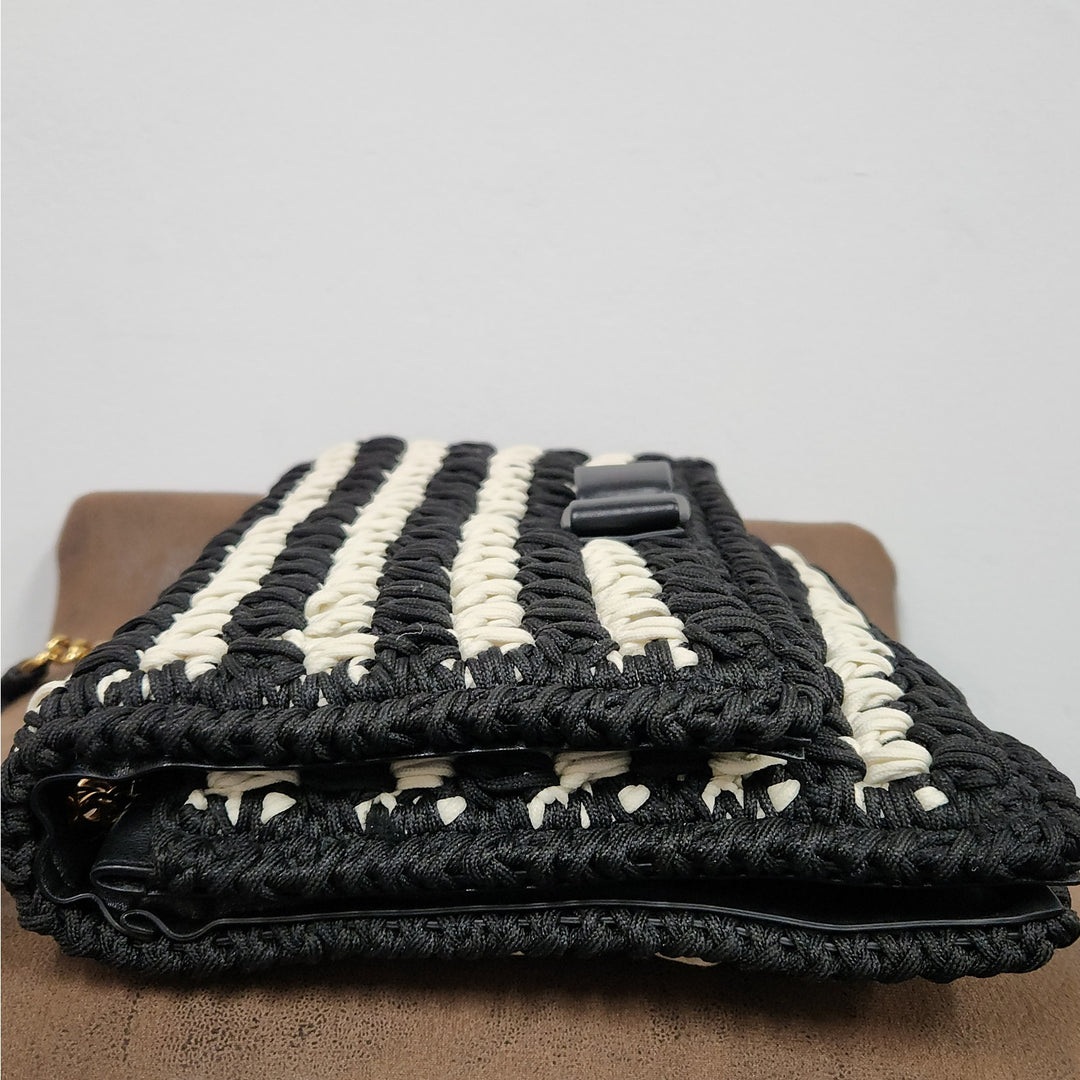 Ferragamo black & white handwoven shoulder bag  gold chain strap signature bow