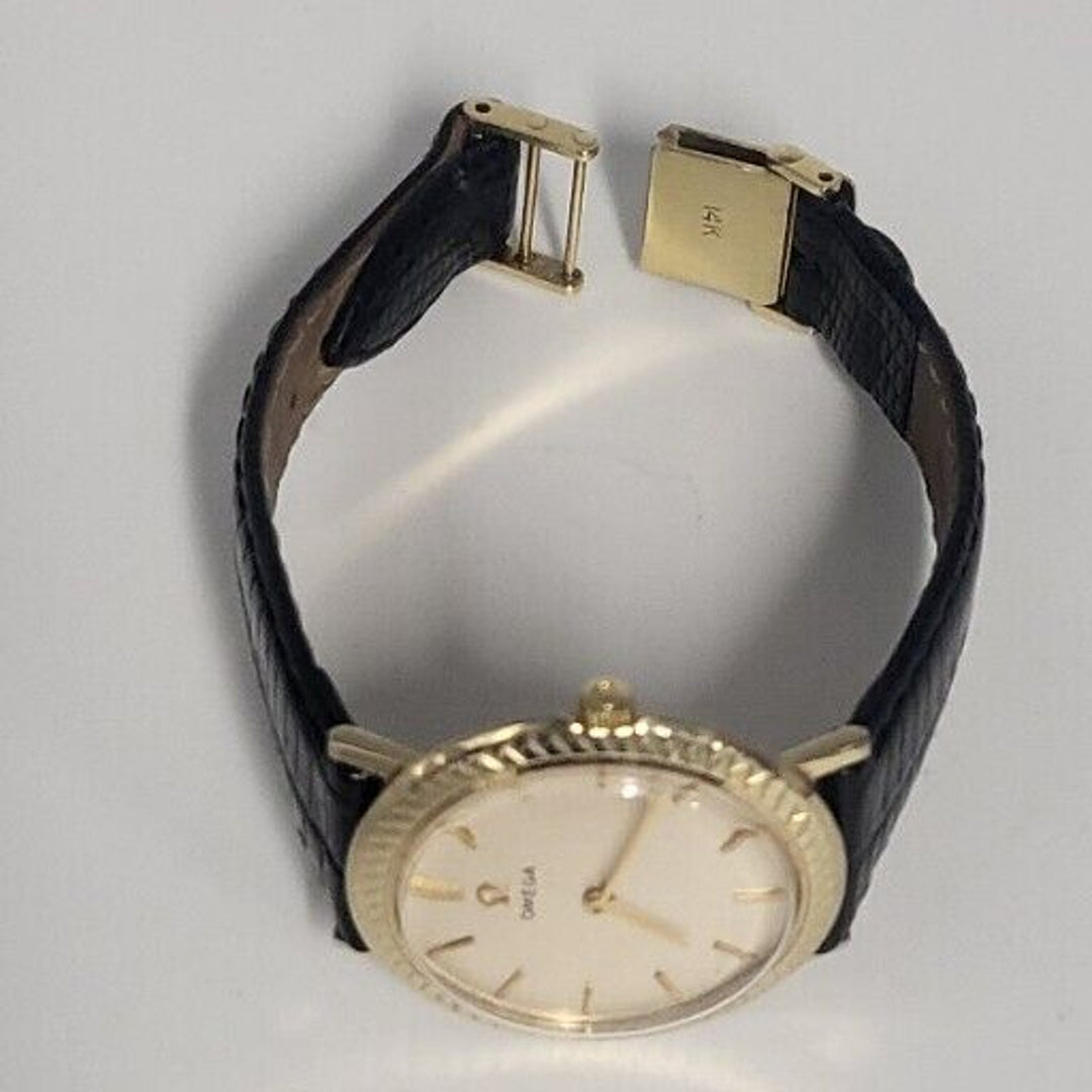1960s OMEGA 32 mm .Vintage Mechanical 14k Yellow Gold Gents Dress Watch